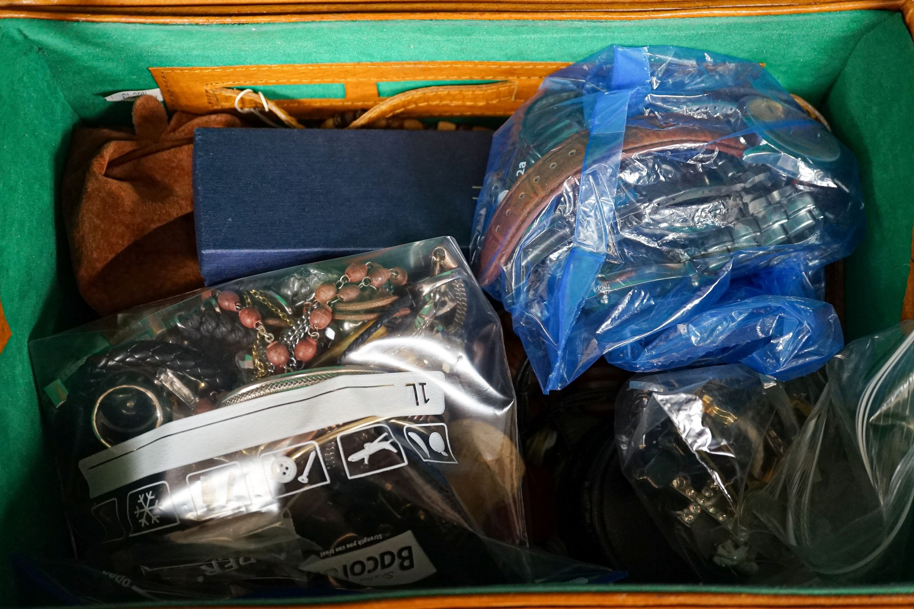 A quantity of costume jewellery in two cases.